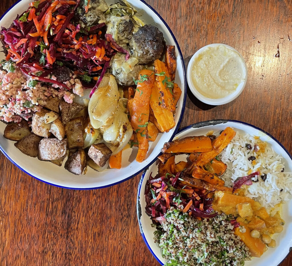 Large plates of very colourful healthy food, including roots, beetroot slaw and coriander rice!