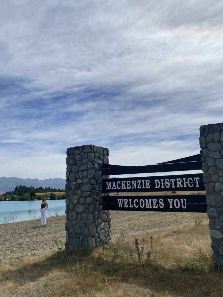 A photo of the road side sign welcoming you into the Mackenzie District in New Zealand.